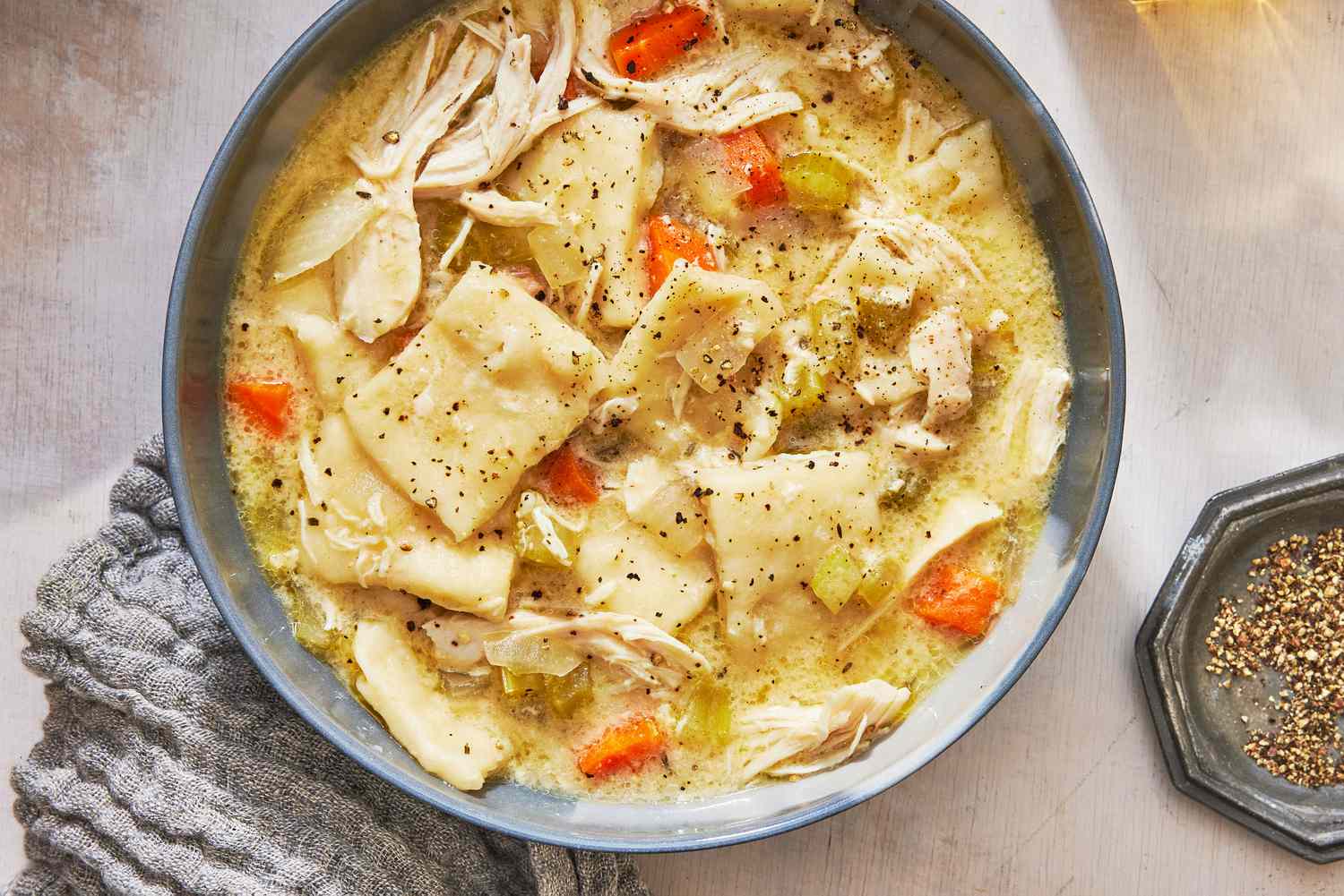 Southern Living Slow Cooker Chicken and Dumplings in a bowl to serve