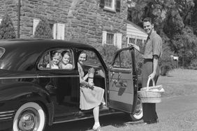 1940s Family Getting in Car 