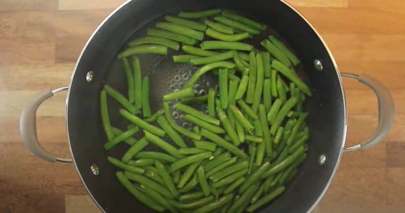 Boil green beans.