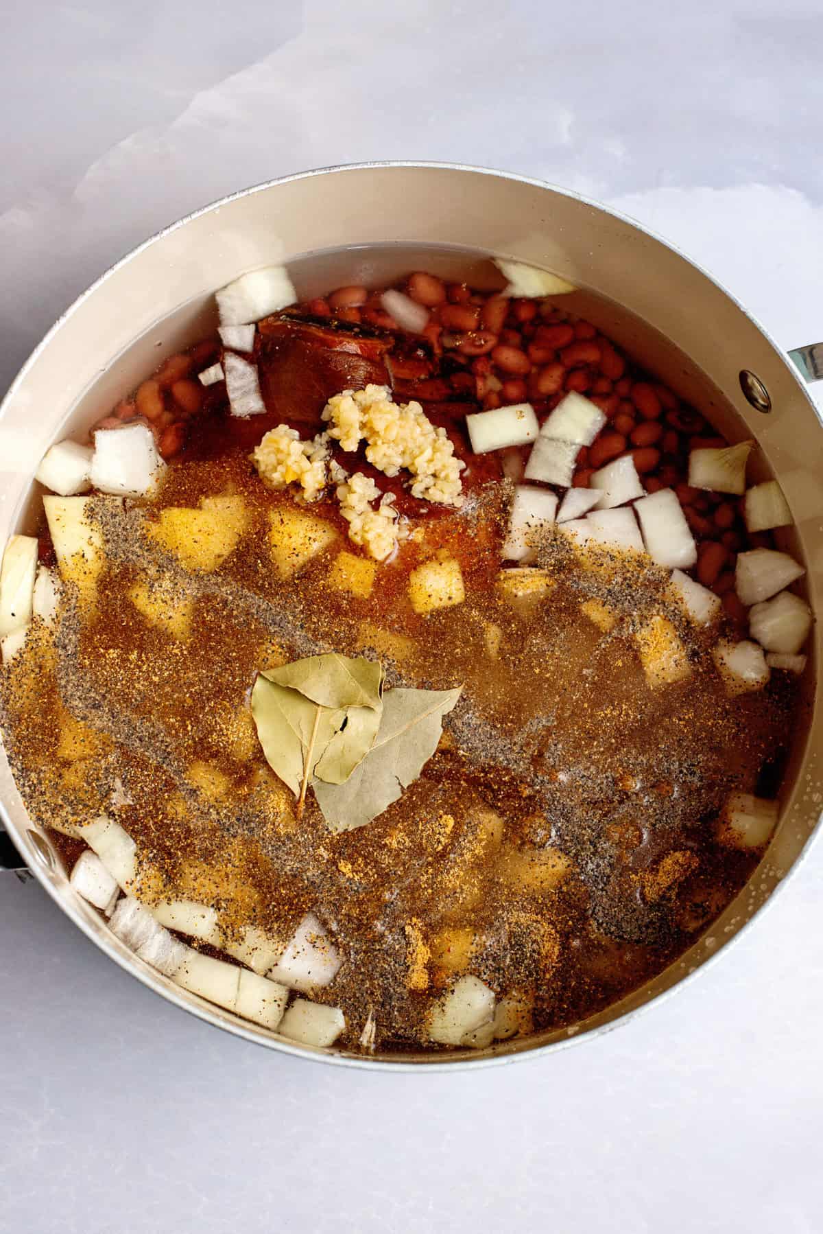 Add ingredients for beans into pot. 