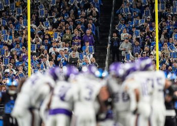 Detroit Lions fans cheer against Minnesota Vikings before a third down during the second half at Ford Field in Detroit on Sunday, Jan. 5, 2025.