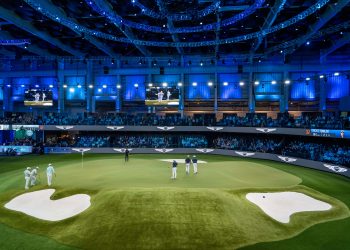 The Bay Club and New York Golf Club compete at the SoFi Center, the home of TGL, the interactive golf league founded by Tiger Woods and Rory McIlroy on January 7, 2025 in Palm Beach Gardens, Florida. (© GREG LOVETT/PALM BEACH POST / USA TODAY NETWORK via Imagn Images)