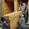 Workers from River City Movers conduct a direct delivery May 9 for Staff Sgt. Cornel Varnado Jr., 194th Military Police Company, 716th Military Police Battalion, at Fort Campbell whose belongings were transported overseas from his previous duty station in Germany during a government move. Pictured are Russell McClendon, driver and crew leader, left; Cory Hemmings, driver; and Craig Carter; driver and crew leader.