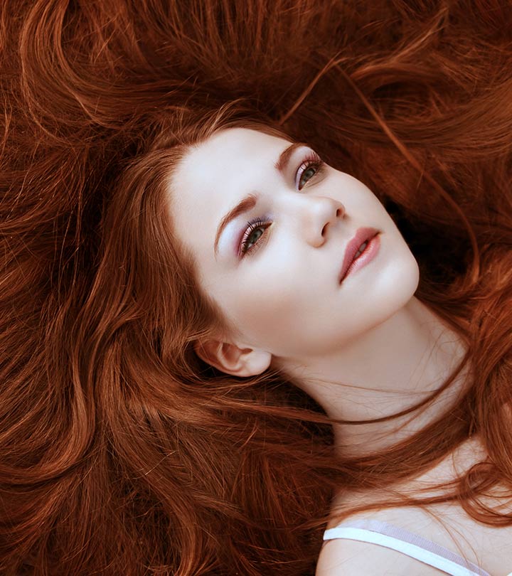 A woman with henna for hair growth