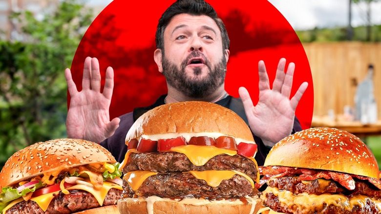 Adam Richman with loaded burgers