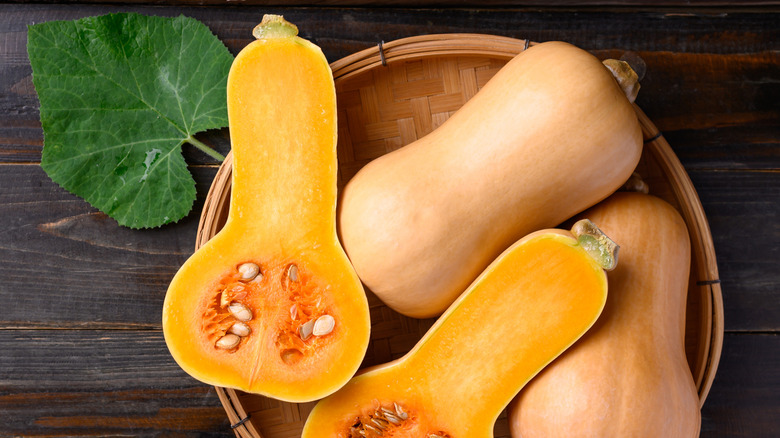 halved butternut squash in basket