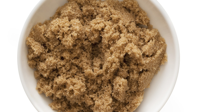 Brown sugar in white bowl