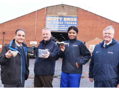 L-R) Dr Sina Rezaei Gomari, Associate Professor of Research; Peter Scott, Director, Scott Bros; Eghe Ikponmwosa-Eweka, KTP Associate; Bob Borthwick, Director, Scott Bros. Pictured holding clay to be used in the artificial soil as well as a drone that will be used in the monitoring of the test site.. Link to L-R) Dr Sina Rezaei Gomari, Associate Professor of Research; Peter Scott, Director, Scott Bros; Eghe Ikponmwosa-Eweka, KTP Associate; Bob Borthwick, Director, Scott Bros. Pictured holding clay to be used in the artificial soil as well as a drone that will be used in the monitoring of the test site..