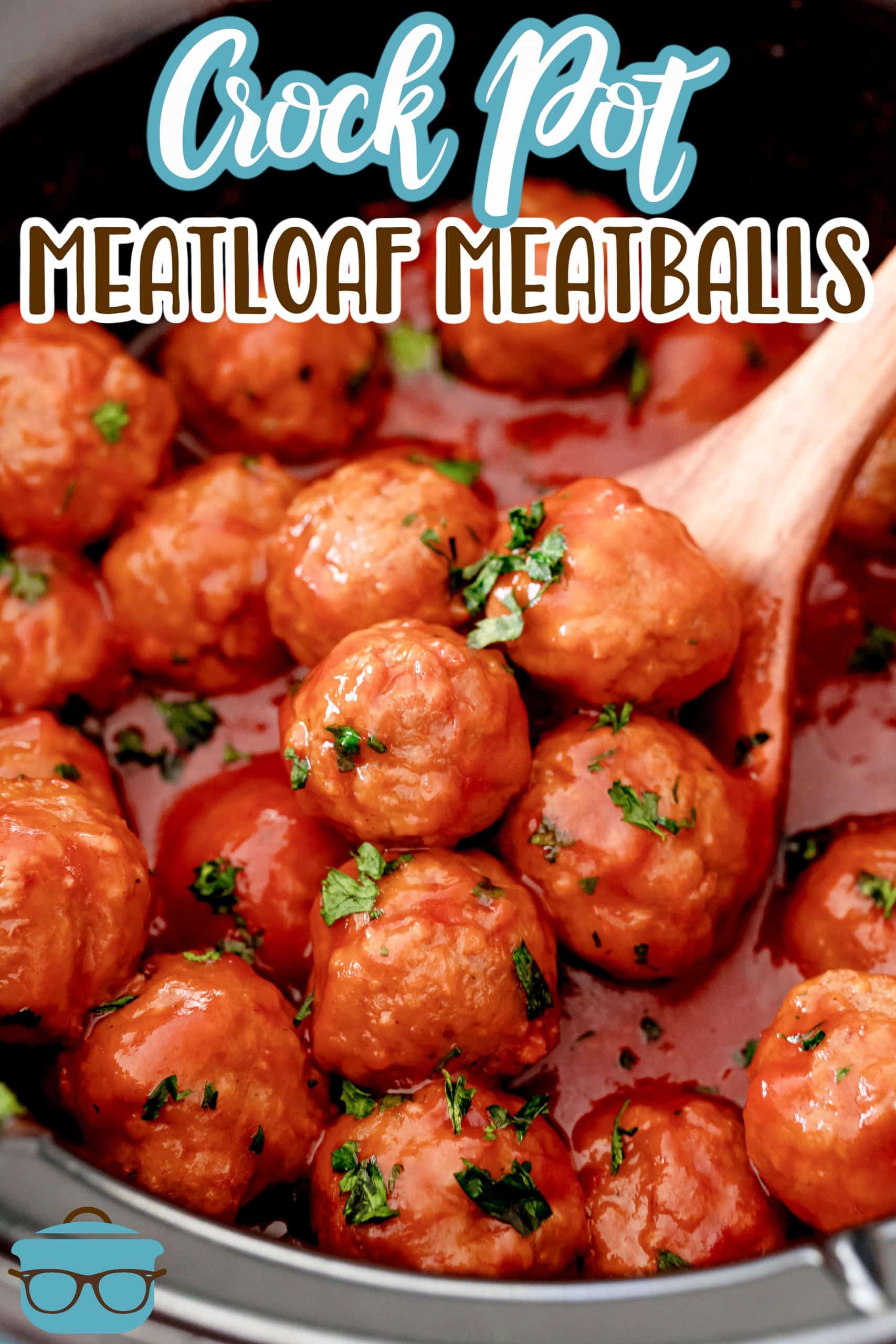 Finished Crock Pot Meatloaf Meatballs with serving spoon in crock pot