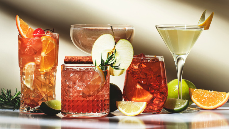 a variety of colorful mocktails made with teas