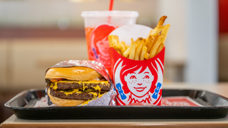 A Wendy's burger with fries.