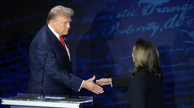 Donald Trump, Kamala Harris shaking hands