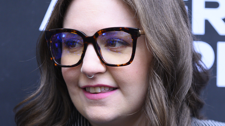 Lena Dunham posing in glasses