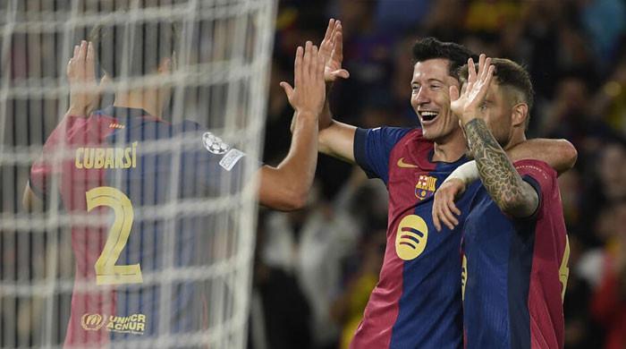 Lewandowski hits brace as Barca crush Young Boys