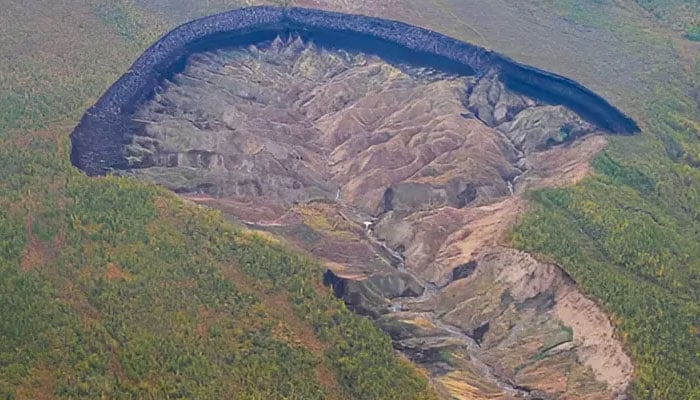 A crater known as the Gateway to Hell in the Yana Highlands of Siberia. — Murton et al/Permafrost Periglacial Processes