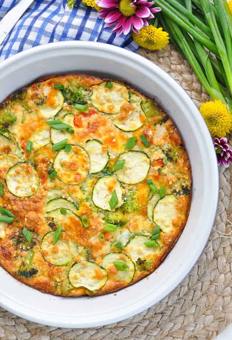 An overhead closeup image of a Vegetable Pie in a round baking dish