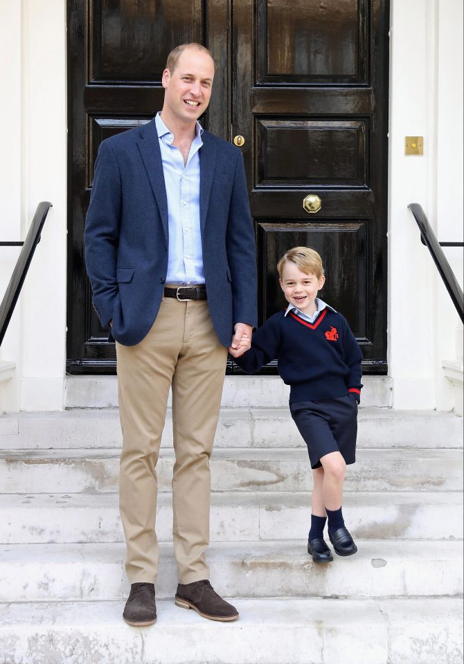  Prince William and George pose outside Kensington Palace on the way to school