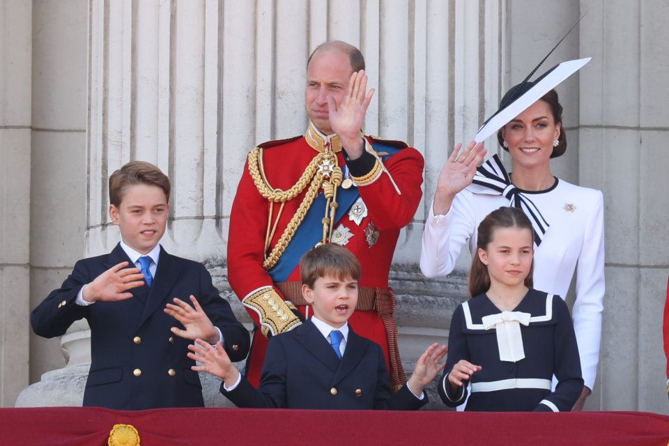 Kate Middleton and her family wave to the crowds from the Buckingham Palace balcony