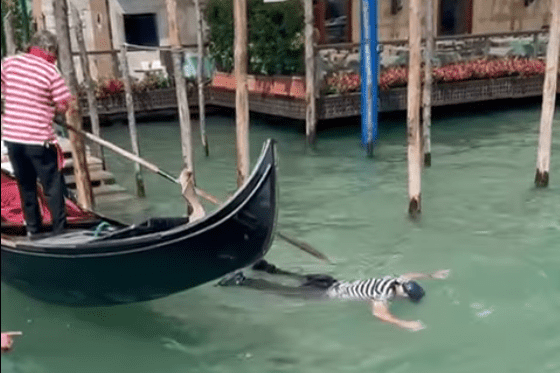 In sweltering Venice, even the locals are breaking the rules to cool off