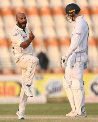 A gleeful Sajid Khan celebrates the wicket Ben Duckett in the first over