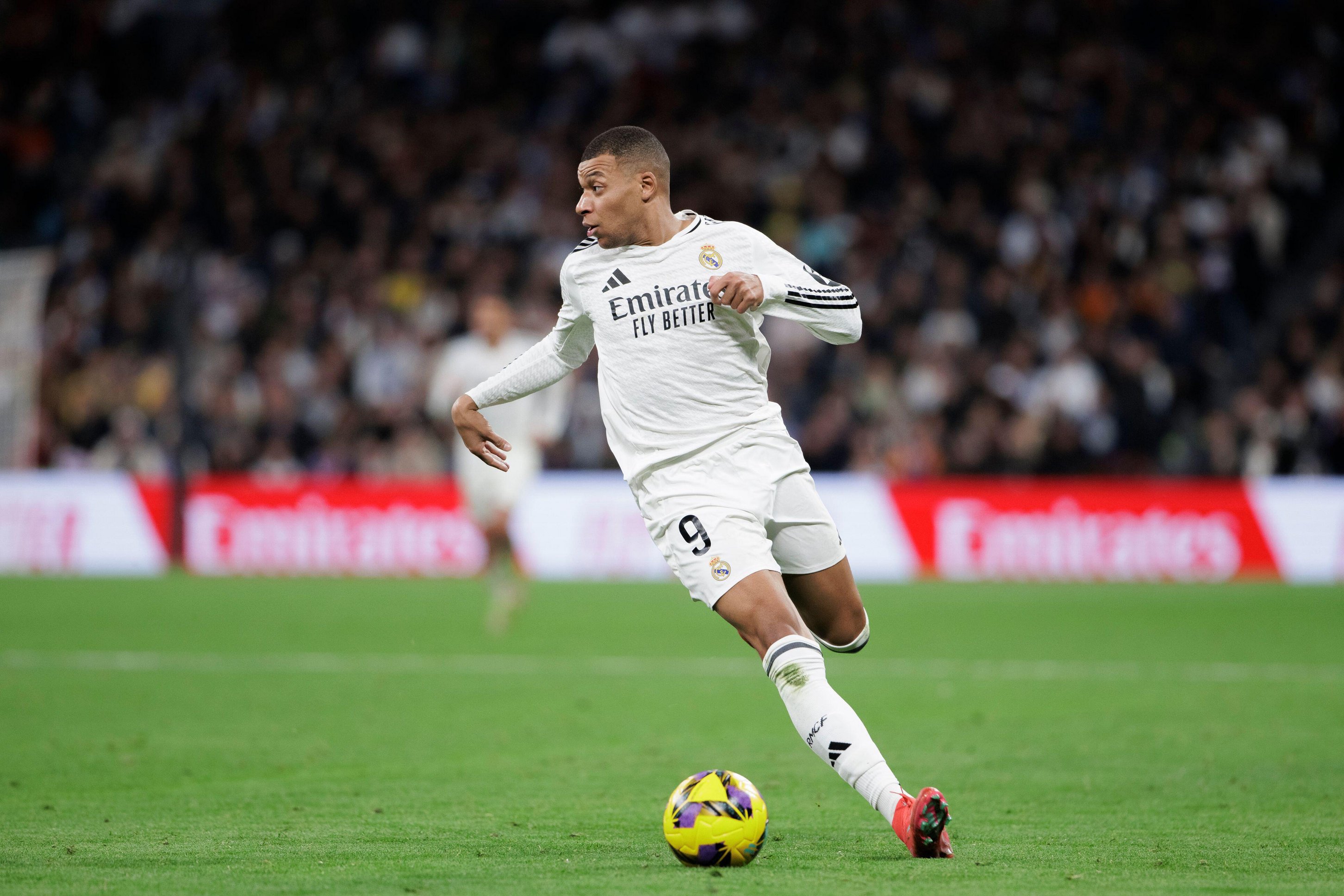 Kylian Mbappé of Real Madrid playing soccer.