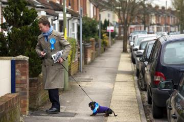 Conservative MP Gregory Barker and his dog Otto canvas for votes.