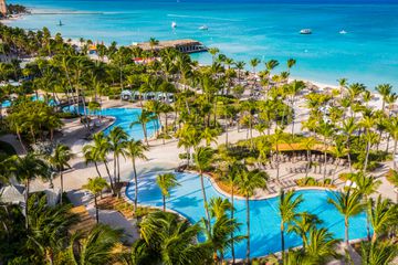 Aerial view of the pool area along the beach at the 