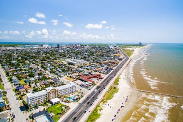 Flying over Galveston Texas Sea Wall and Beach 