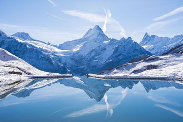 The Swiss Alps reflected in Lake Bachalsee.