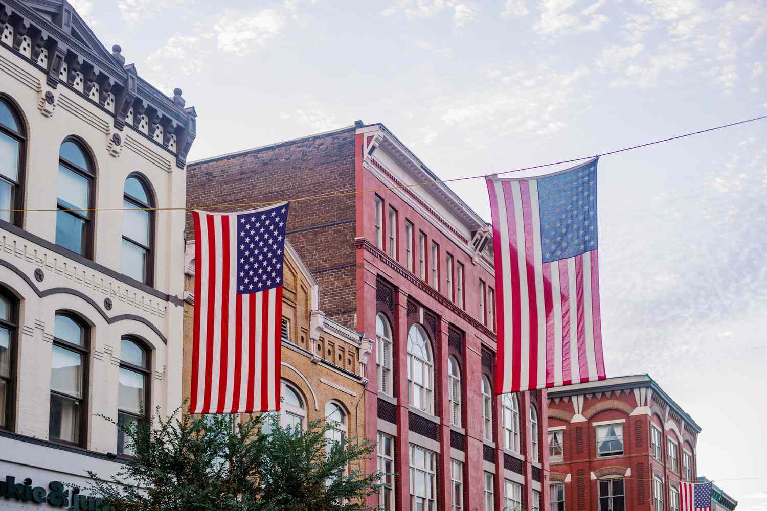 Flags hanging near old buildings in Savannah, GA