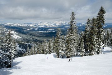 Fresh snow on slopes in alpine resort at Lake Tahoe