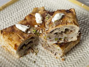 Close-up is Egypt's famous and traditional dessert Om Ali, Umm Ali or Oum Ali.