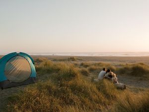 Family watching sunset at Gold Bluffs Beach.