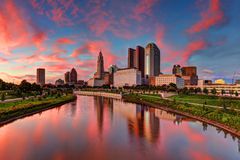 Columbus, Ohio cityscape on a river at sunset