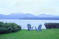 Two Adirondack Chairs Beside Blue Mountain Lake