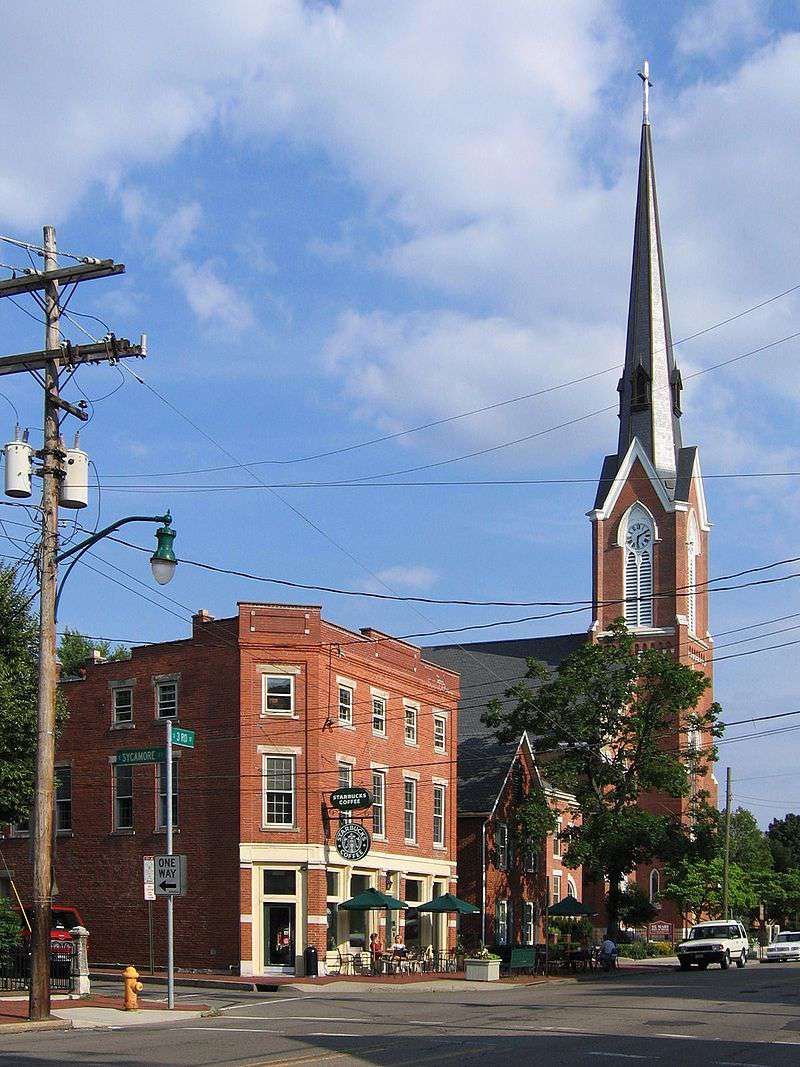 The center of German Village, Columbus, Ohio on Third Avenue. The steeple of St. Mary's (1868) is seen in the background.