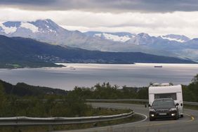 RV turning on the highway