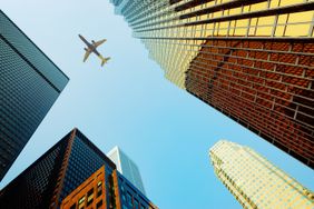 Passenger jet approaching to a city airport in Canada