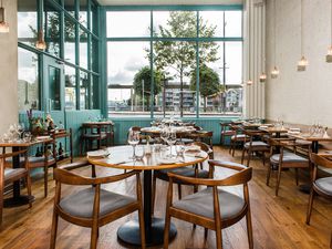 Interior of fine dining restaurant with bright natural light