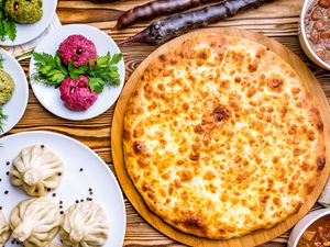 Georgian cuisine foodset from khachapuri, khinkali, pkhali, dolma, lobio top view