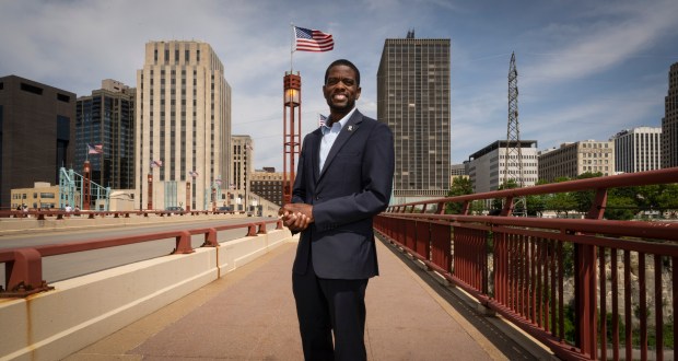 Melvin Carter with downtown St. Paul in the background