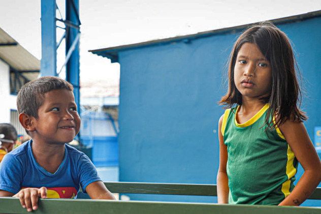 Two children sitting in safe space in Brazil