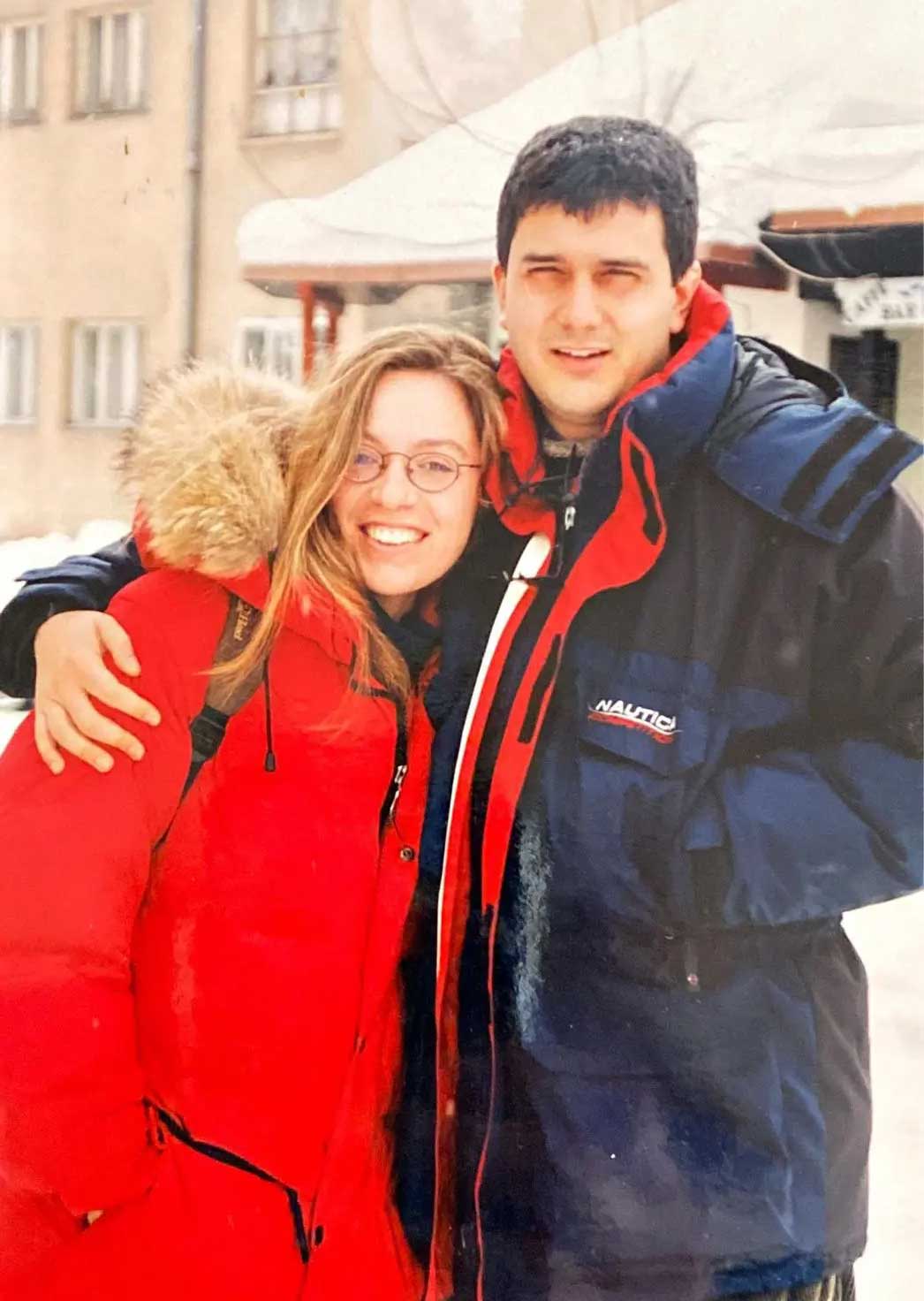 Laura stands with Jean-Sélim for a photo in the snow