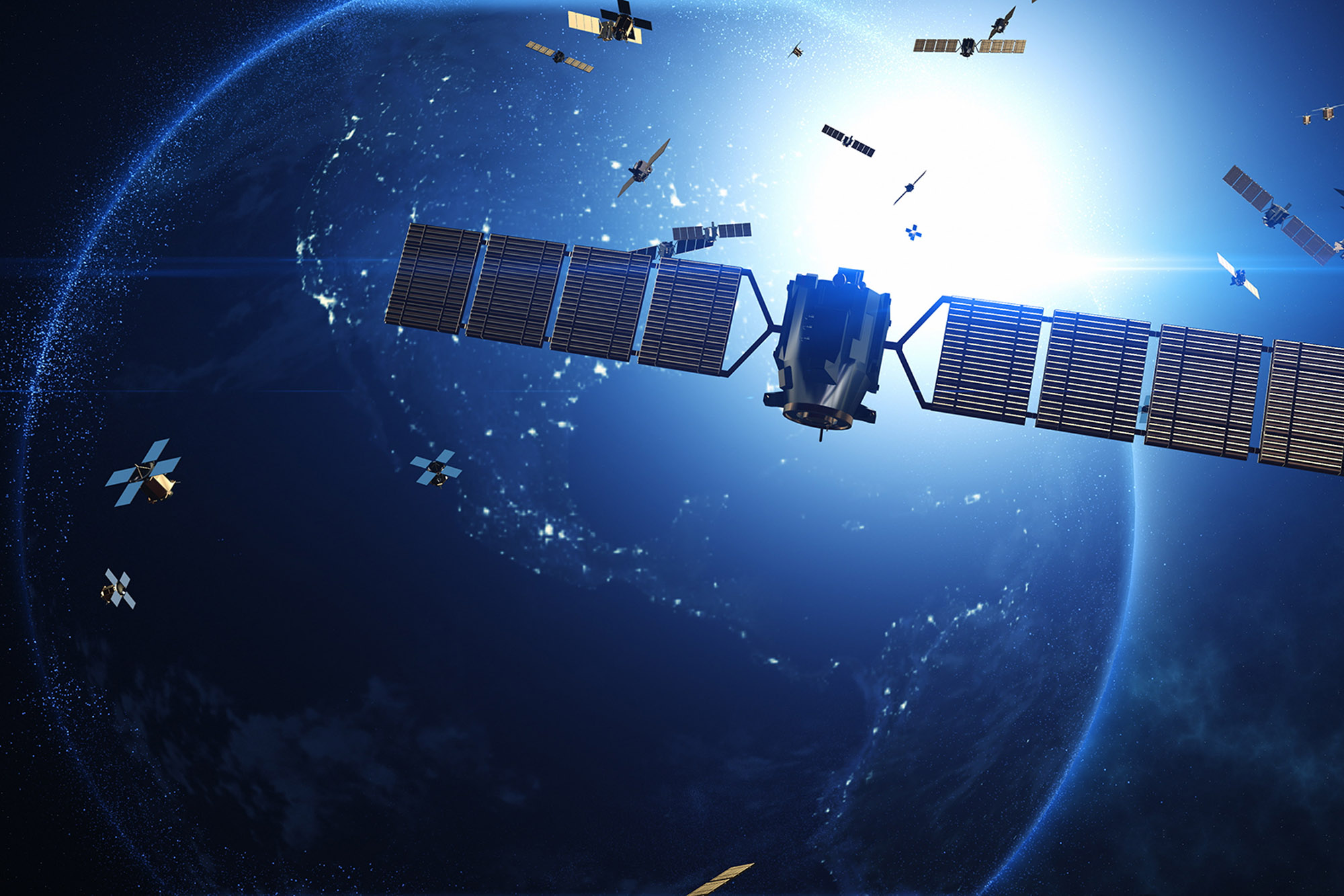 Satellites en orbite autour de la Terre facilitant les télécommunications et l'internet à haut débit.