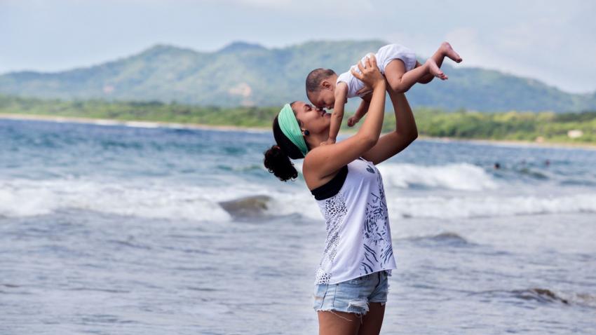 mother and child on the beach