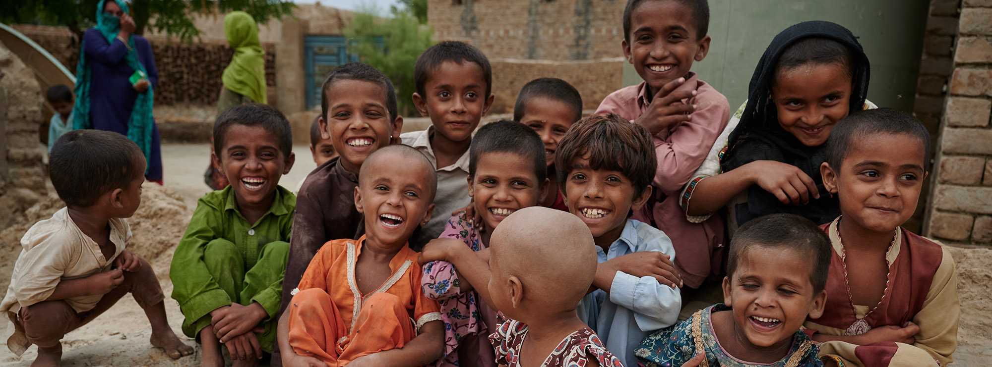 Young people of various posing for a photo