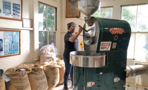 Woman with a coffee grinder