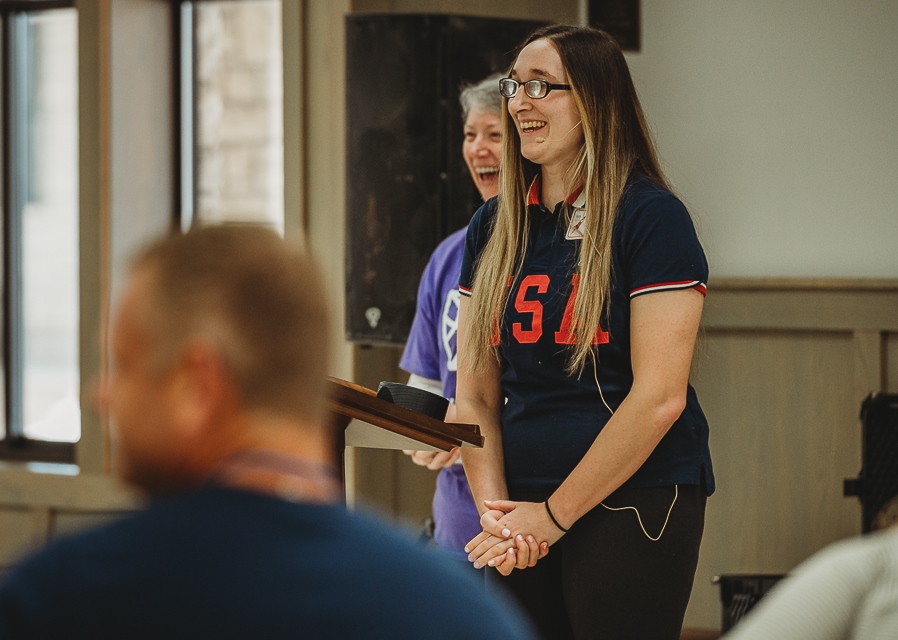 Eliana Mason speaks at a conference.