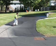 Driveway sealcoating