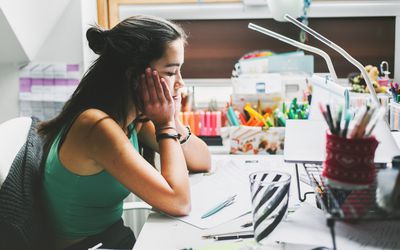 young woman having trouble focusing